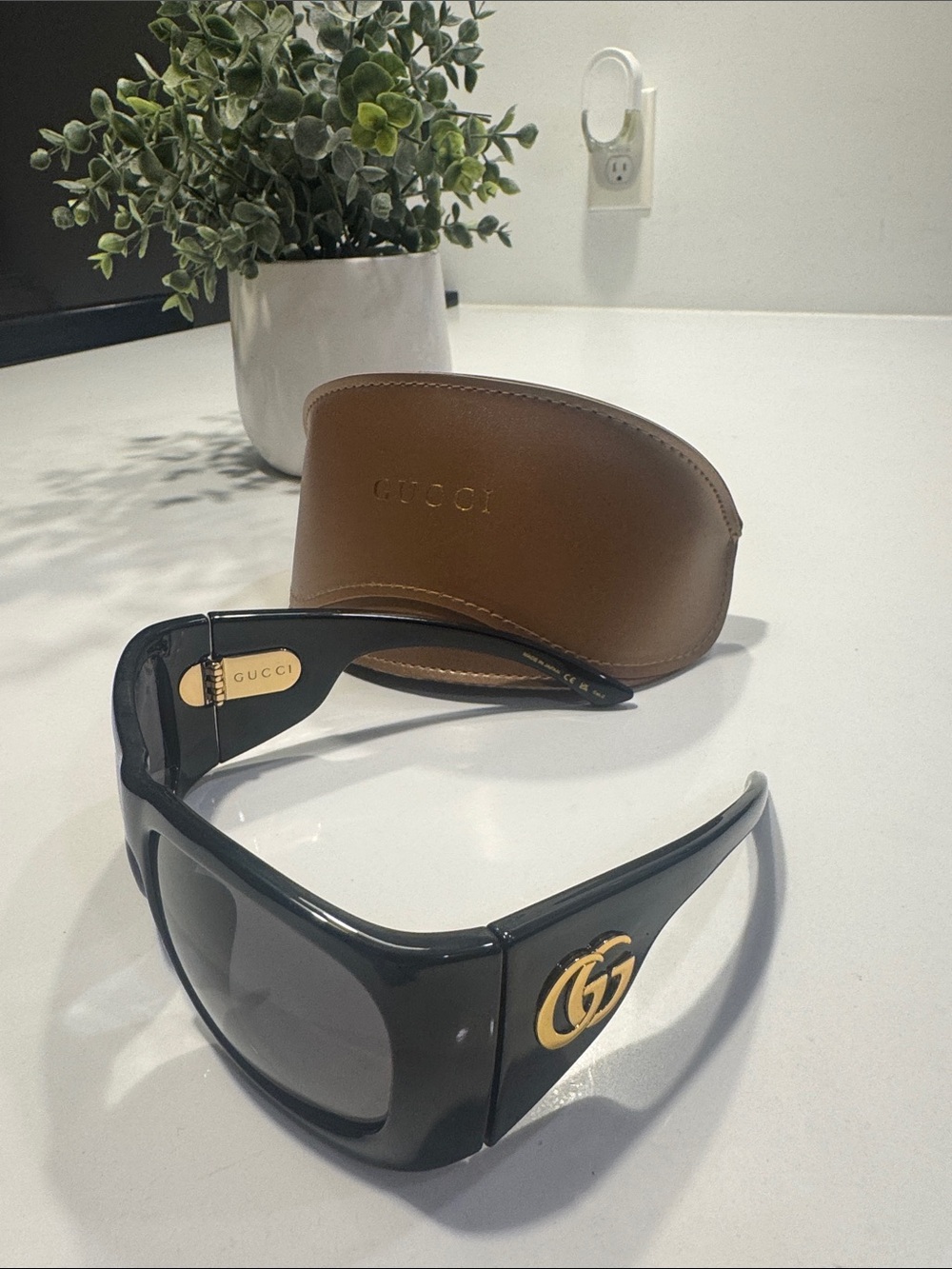 Gucci Black Shield Sunglasses with Gold GG Emblem
